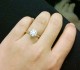 Customer photo: Special order 18kt yellow gold Timeless Regal with white gold prongs, holding a 7.5mm certified J color OEC Forever Brilliant, ring size 4.25