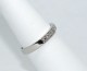 Our Cartier-style 1895 band, shown here in platinum and ring size 7.