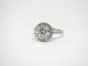 Timeless Halo in platinum, ring size 6.75 and set with a 7.7mm G/VS2 Amora Gem