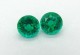Matched pair of C Grade 6mm round Avarra emeralds, currently in stock