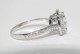 Timeless Halo in platinum, ring size 6.75 and set with a 7.7mm G/VS2 Amora Gem
