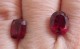 Customer photo of an 8x10mm oval Avarra ruby, also included in the picture is an 8.5mm x 6.5mm elongated cushion cut Avarra ruby.