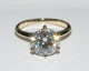 Timeless Regal Reproduction in 14kt yellow gold, ring size 6.5, and set with a 9.25mm E/VS2 Amora Gem