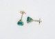 7mm emeralds set in 14kt yellow gold Martini earring settings with locking Protektor backs.