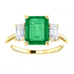 Firande 3 Stone Ring, in 14kt yellow gold with an 8x10mm emerald center (not included, but we do offer Avarra lab-grown emeralds in emerald cut!).  Ring size approximately a 7.