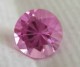 Customer photo of an 8mm Pink Avarra sapphire round.  Photo used for color reference only.
