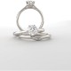 Coronet Solitaire Ring shown here with optional but available matching band.  Center stone is a 6.5mm round.