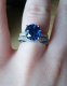 Customer photo : 9mm concave round Kashmir blue Avarra sapphire set in our 2-row Micropave Cathedral, ring size 7.  Band is customer's own.